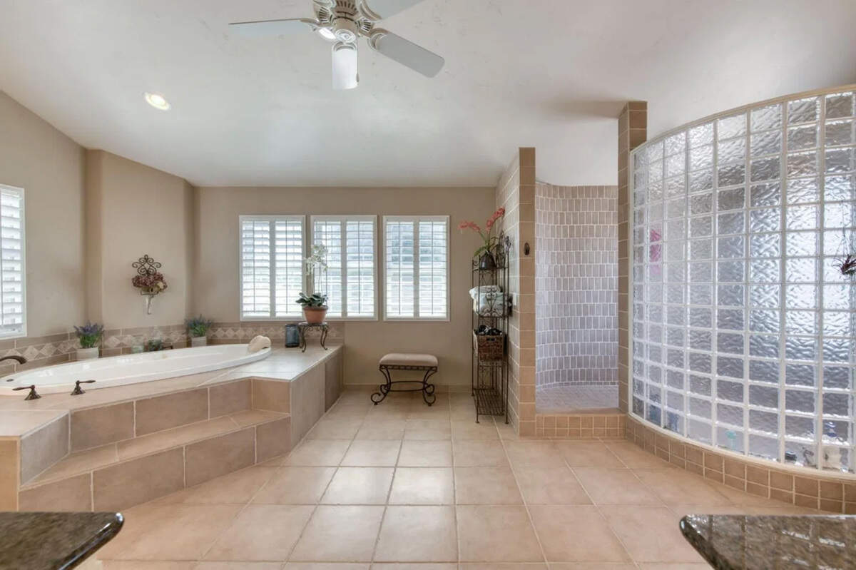 The property at 8584 N. Madsen Ave. is described as a European-inspired estate.